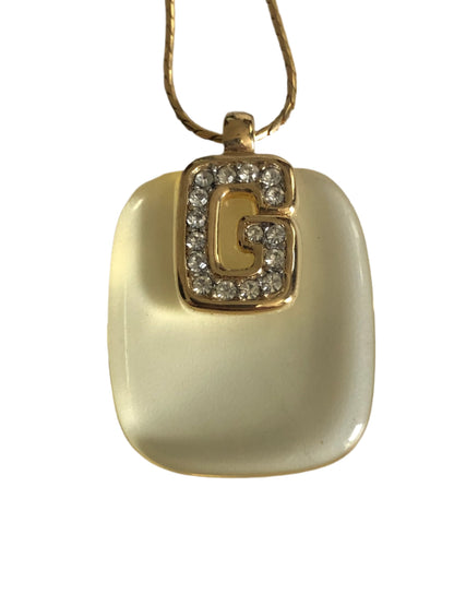 Vintage GIVENCHY lucite pendant logo clear rhinestones