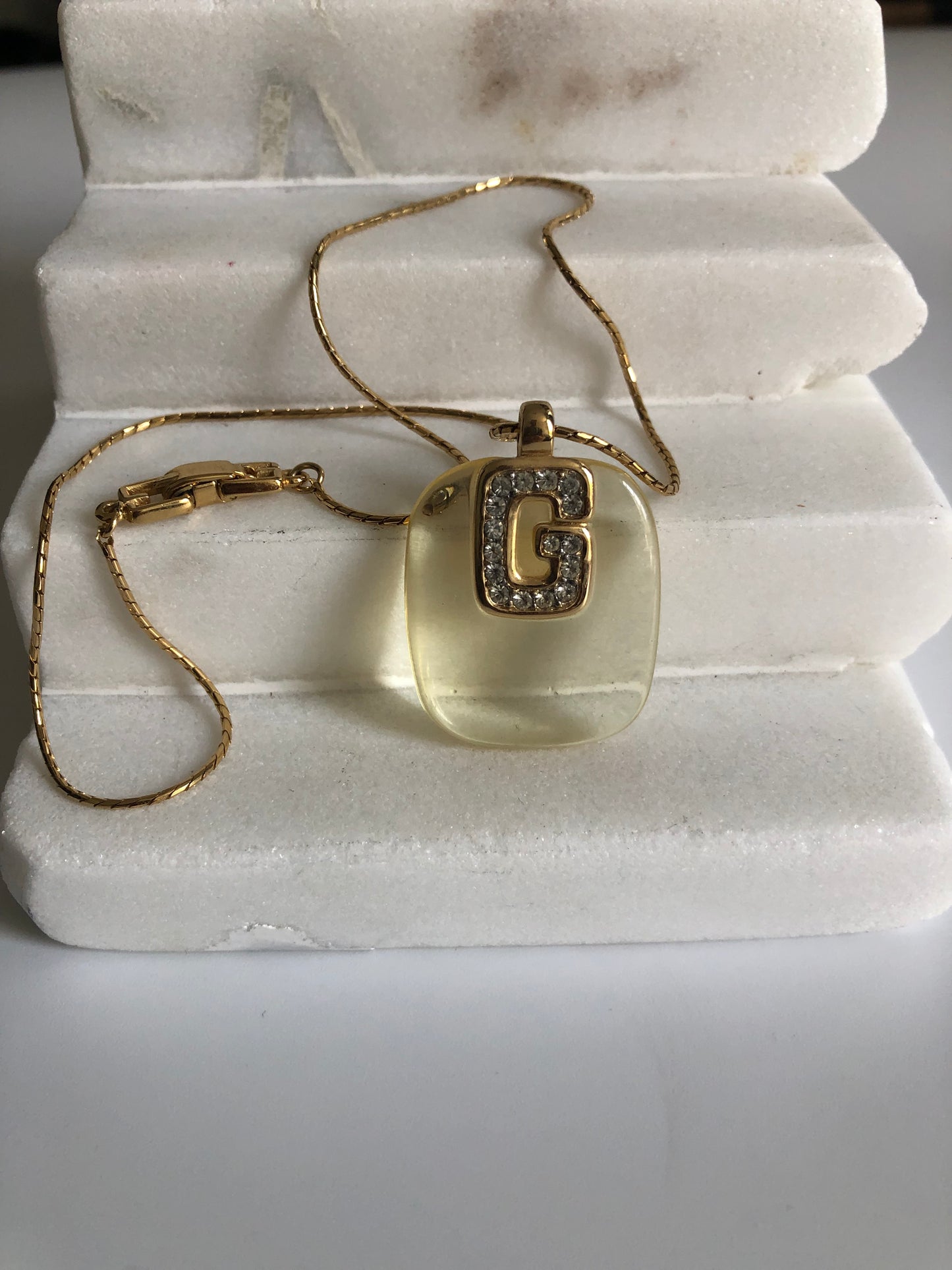 Vintage GIVENCHY lucite pendant logo clear rhinestones